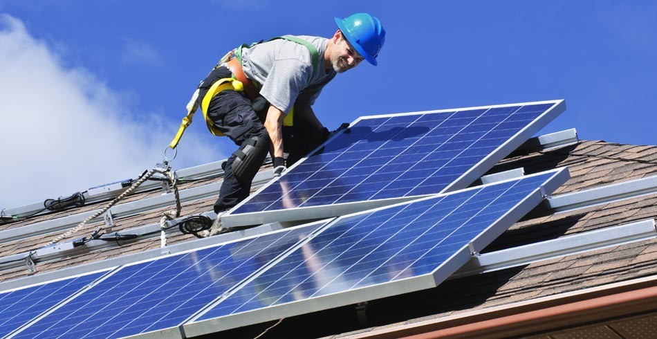 Solar panels being installed on a roof (rooftop solar)