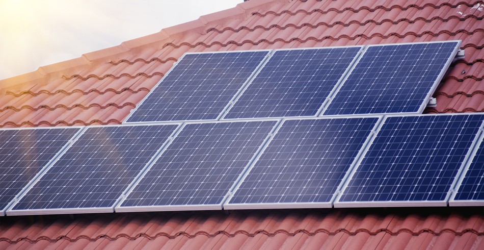 Rooftop solar panels on suburban home (energy upgrades)
