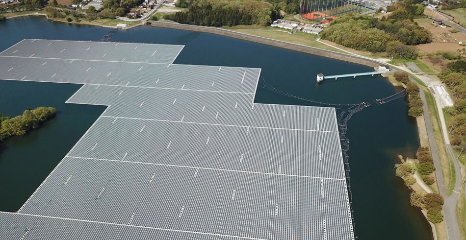 Aerial shot of floating solar panels in Yamakura Dam, Japan