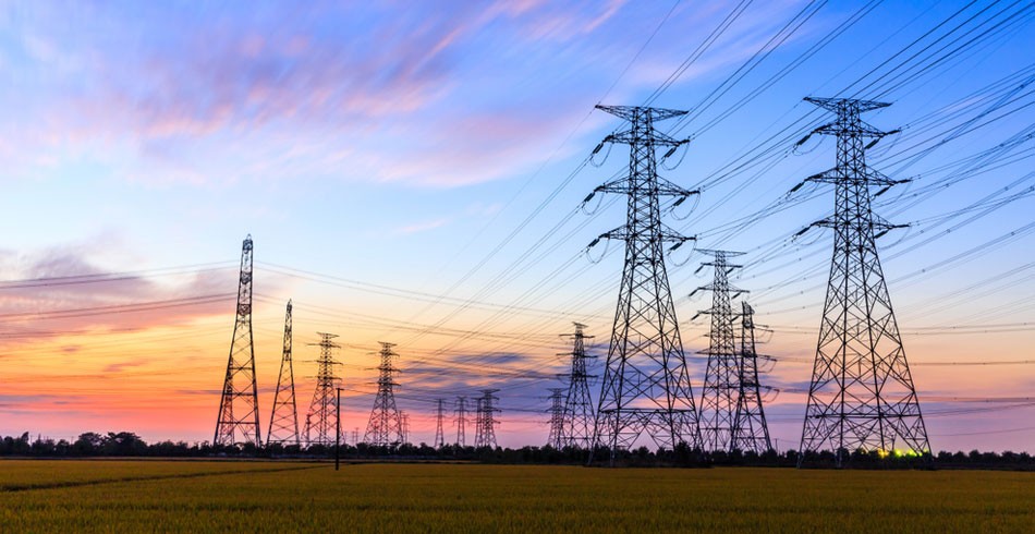 Transmission towers against sunset (ACCC coordination)