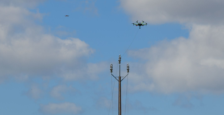 A drone re-strings a powerline (SA Power)