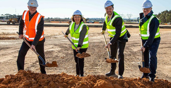 Energy executives and Victorian Energy Minister Lily D'Ambrosio MP perform sod turning ceremony at the site of the Rangebank BESS