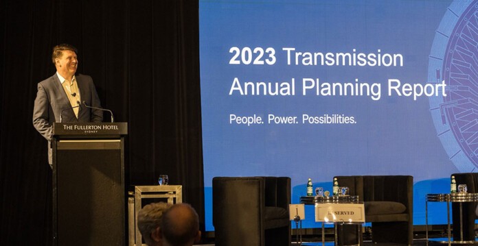 Transgrid CEO Brett Redman presents TAPR 2023 report at lectern