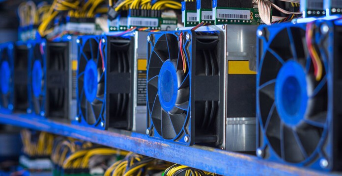 Row of computer processors set up for crypto mining (miners)